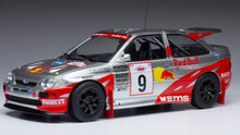 Indlæs billede til gallerivisning Ford ESCORT RS COSWORTH RED BULL #9 VATANEN/PONS RALLY ACROPOLIS 1994 sølv/rød 1:18