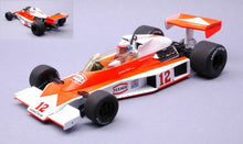 Indlæs billede til gallerivisning Mclaren M23 MARLBORO TEAM McLAREN FORMUL 1 #12 JOCHEN MASS GP DEUTSCHLAND 1976 rød/hvid 1:18