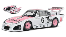 Indlæs billede til gallerivisning PORSCHE 935K3 TEAM PORSCHE KREMER RACING N 6 WINNER 1000km SUZUKA 1981 B.WOLLEK - H.PESCAROLO WHITE PINK 1:18