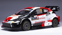 Indlæs billede til gallerivisning Toyota GR YARIS RALLY1 HYBRID #17 OGIER/LANDAIS SAFARI RALLY 2023 hvid/sort/rød 1:18