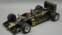 Indlæs billede til gallerivisning Lotus 94T #12 NIGEL MANSELL EUROPEAN GP 1983 + FIGUUR sort/guld 1:18