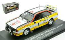 Indlæs billede til gallerivisning AUDI SPORT QUATTRO A2 TEAM AUDI SPORT (night version) N 1 WINNER RALLY MONTECARLO 1984 WALTER ROHRL - CHRISTIAN GEISTDORFER WHITE YELLOW 1:43
