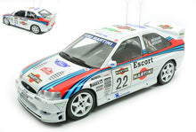 Indlæs billede til gallerivisning FORD ENGLAND ESCORT WRC TEAM MARTINI RACING JOLLY CLUB N 22 RALLY SANREMO 1998 ANGELO MEDEGHINI - BARBARA CAPOFERRI MEDEGHINI WHITE RED BLUE 1:18