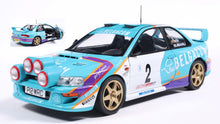 Indlæs billede til gallerivisning SUBARU IMPREZA WRC99 TEAM BELGACOM (night version) N 2 4th RALLY BELGIUM WESTHOEK YPRES 1998 JEAN MARC FORTIN - GREGOIRE DE MEVIUS LIGHT BLUE WHITE 1:18