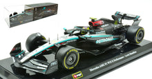 Indlæs billede til gallerivisning Mercedes Benz AMG W15 #44 LEWIS HAMILTON 2024 with Helmet sølv/sort/turkis 1:24