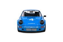 Indlæs billede til gallerivisning PORSCHE 911 CARRERA 3.0 RSR N 4 IROC RIVERSIDE 1974 GEORGE FOLLMER BLUE 1:18