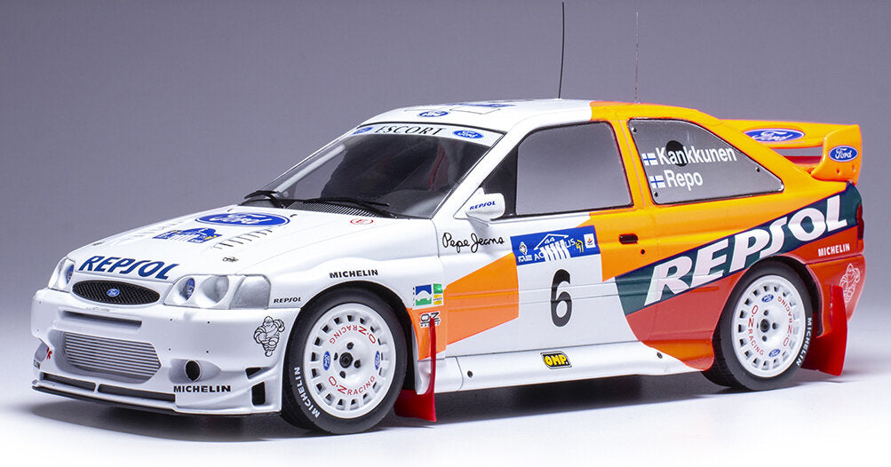 Ford ESCORT WRC #6 KANKKUNEN ACROPOLIS RALLY 1997 hvid/orange/blå 1:18