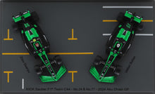 Indlæs billede til gallerivisning STAKE F1 TEAM KICK SAUBER C44 #24 ZHOU GUANYU + #77 VALTTERI BOTTAS ABU DHABI GP 2024 - 2 CAR SET sort/grøn 1:64