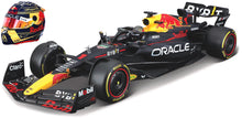 Indlæs billede til gallerivisning Red Bull RB19 #1 MAX VERSTAPPEN &quot;ABU DHABI&quot; GP 2023 - LAST RACE SPECIAL WC HELMET mørk blå/rød/gul 1:18