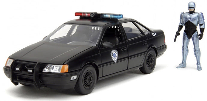 FORD USA TAURUS LX DETROIT POLICE 1986 WITH ROBOCOP FIGURE BLACK 1:24