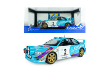 Indlæs billede til gallerivisning SUBARU IMPREZA WRC99 TEAM BELGACOM (night version) N 2 4th RALLY BELGIUM WESTHOEK YPRES 1998 JEAN MARC FORTIN - GREGOIRE DE MEVIUS LIGHT BLUE WHITE 1:18
