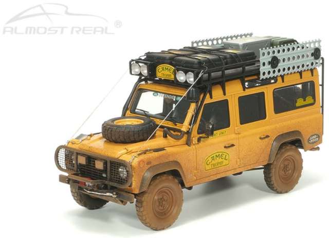 Land Rover Defender 110 Camel Trophy Dirty Version, yellow 1:18